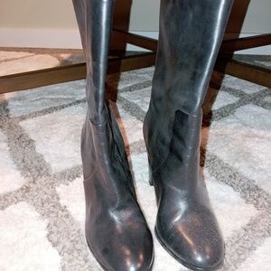 Black high heeled all leather boots